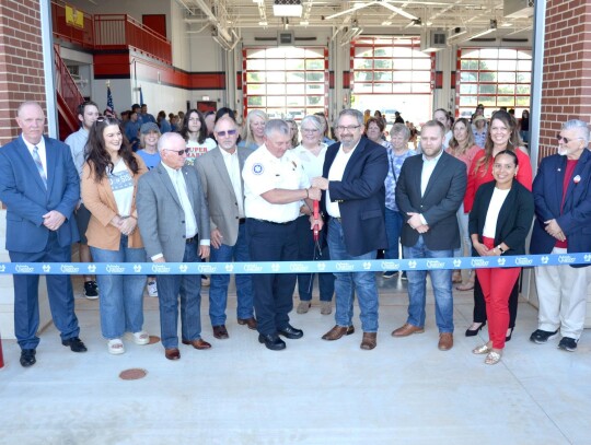 • photo by Mark Codner Fire Chief Todd Yates and Mayor Karl Nail are joined by City Manager Kevin Self, city council members Marci Nail, Gene Reid, and Mike Fullerton, Tyler Ediger, project manager of Lingo Construction, Maria Prado, architect of Guerns