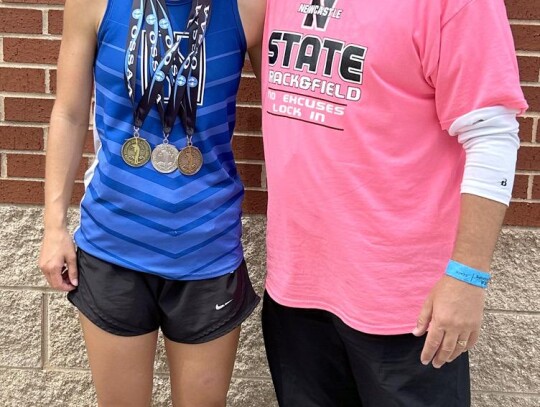 3 medals at State Newcastle junior Katie Lewis is pictured with Head Track Coach Jason Haggerty. Katie won three state track meet medals including runner-up in the pole vault with a jump or 10’6”, 5th place medal in the 300m hurdles, and 6th place med