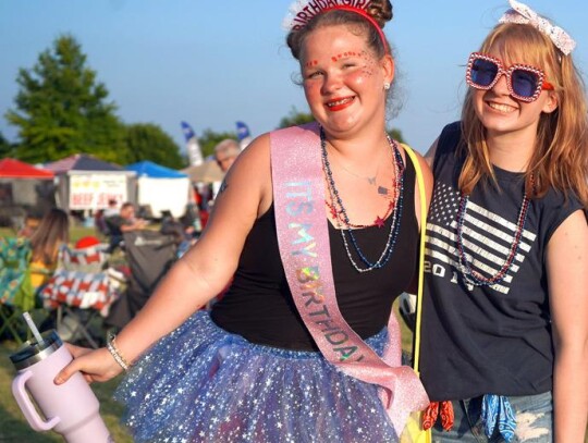 These two girls celebrate a birthday and the Fourth of July at the same time in Newcastle. • photo by Scott Hannan