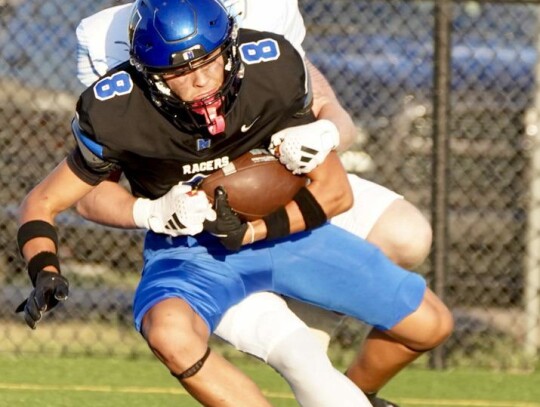 • photo by Jennifer Lewis Kaden Longman bulls his way over for a Newcastle Racer touchdown Friday night against Bartlesville.